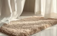 Tapis de bain et rideau de douche : le duo gagnant pour la salle de bain